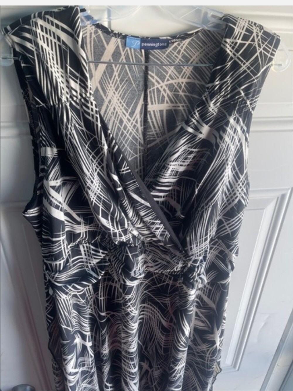 Sleeveless Black and White V-Neck Handkerchief Hem Dress - Picture 6 of 9